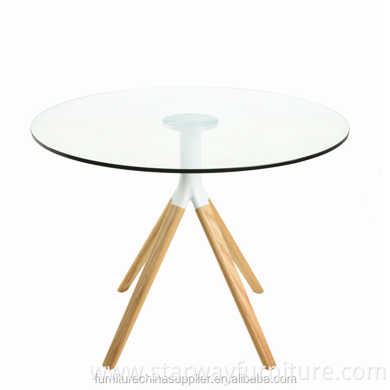 Modern original round glass and wood dining table for living room and restaurant